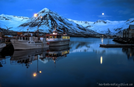 Iceland, Siglufjordur moonrise.